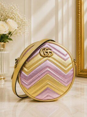 Authentic Gucci GG Marmont Mini Round Metallic Gold Pink Leather Crossbody Bag